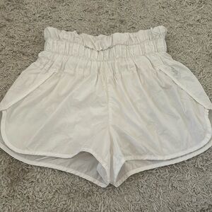 Free people “The Way Home Shorts” in white size small. Worn!